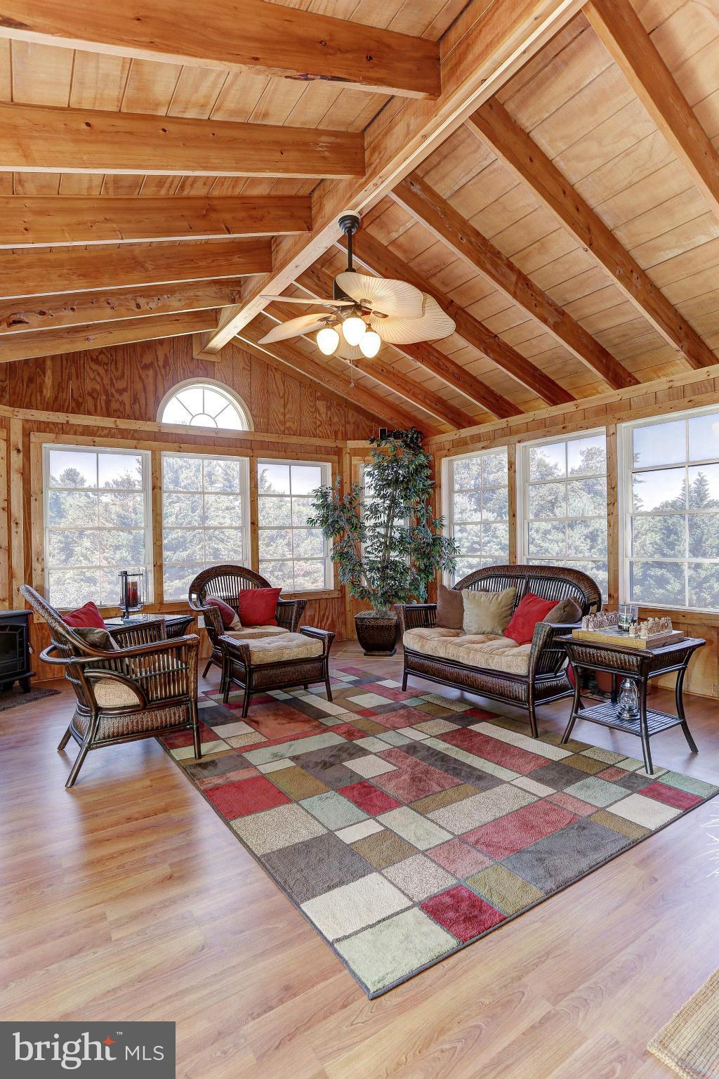 506 Ridge Road Finksburg, MD 21048 - Photo 10 of 30 a living room with furniture a patio and outdoor seating