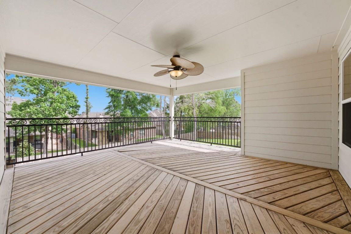 315 Arbor Ridge Lane Conroe, TX 77384 - Photo 11 of 47 But wait, there's more! This covered second story balcony is fantastic for entertaining or just relaxing.