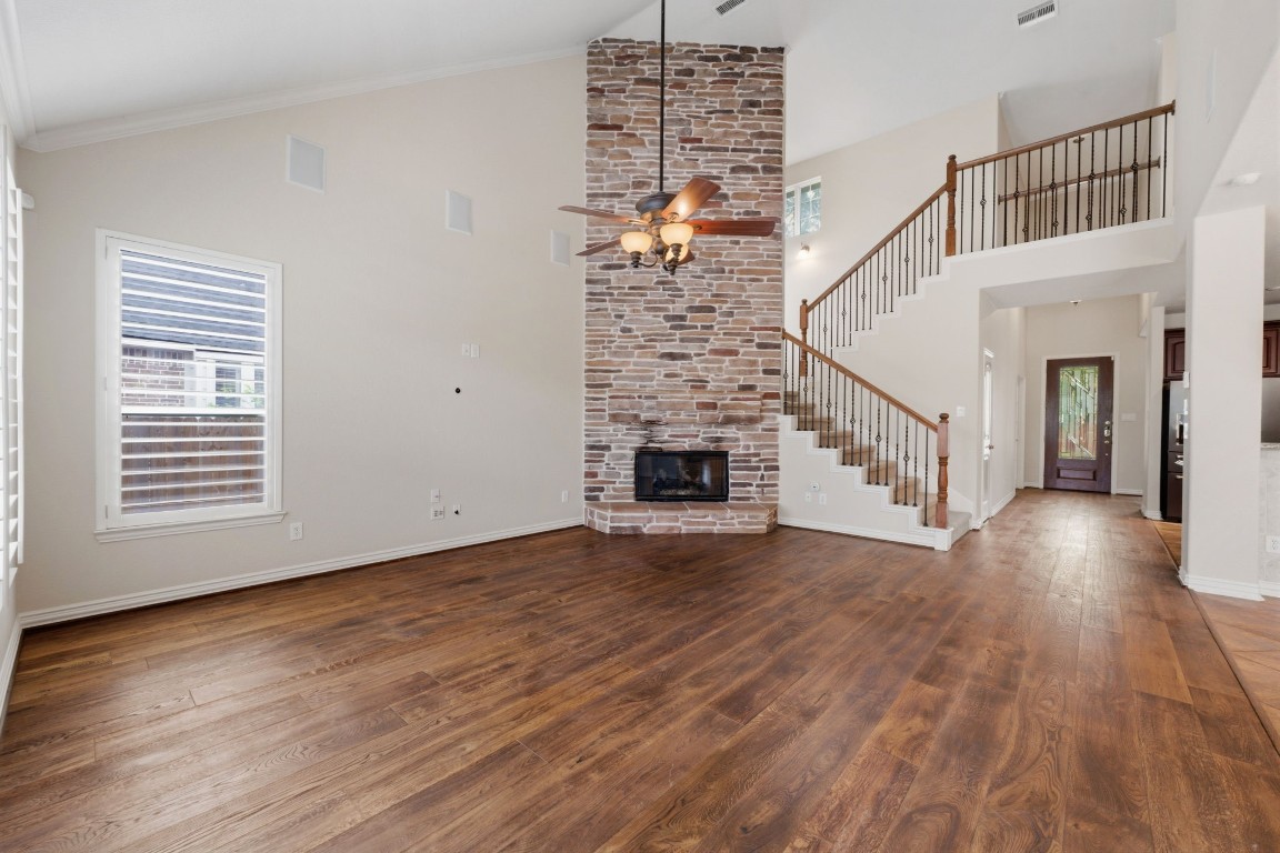 315 Arbor Ridge Lane Conroe, TX 77384 - Photo 15 of 47 Notice the flow from the entry back to the family room.