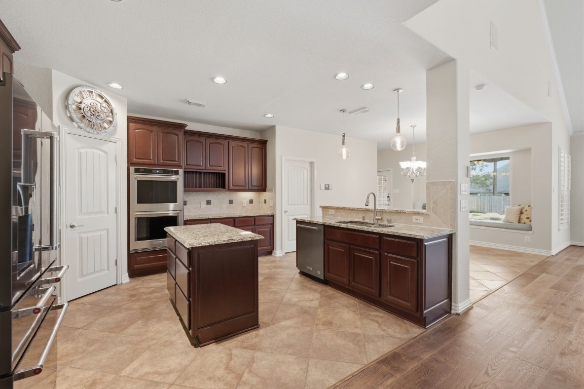 315 Arbor Ridge Lane Conroe, TX 77384 - Photo 16 of 47 Another view of the chef's kitchen looking toward the breakfast area
