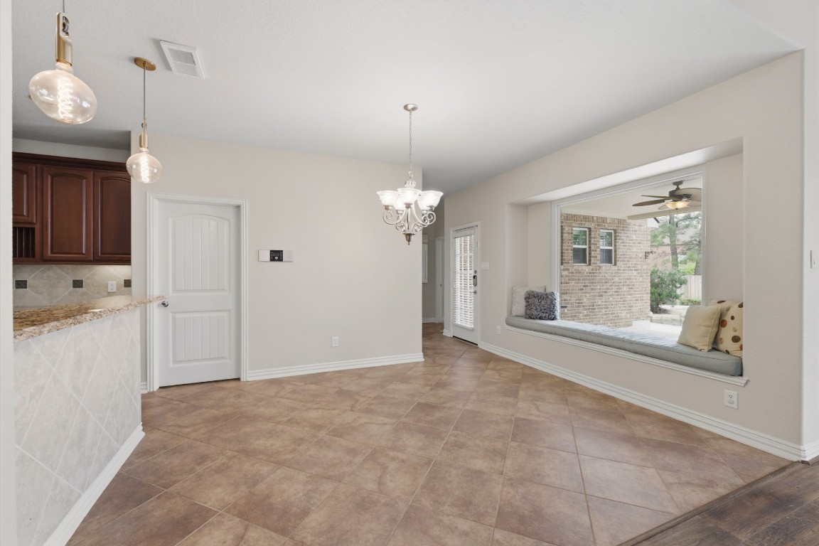 315 Arbor Ridge Lane Conroe, TX 77384 - Photo 18 of 47 You will love the view to the backyard from the massive picture window in the breakfast area.