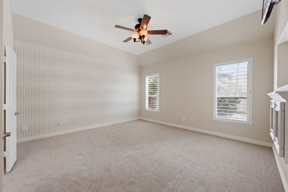 315 Arbor Ridge Lane Conroe, TX 77384 - Photo 19 of 47 First floor primary bedroom