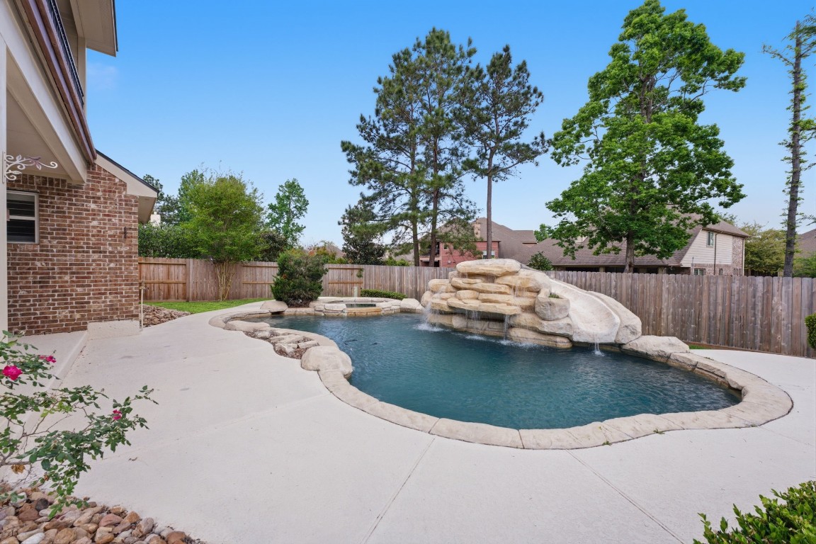 315 Arbor Ridge Lane Conroe, TX 77384 - Photo 2 of 47 Welcome to your backyard oasis!!