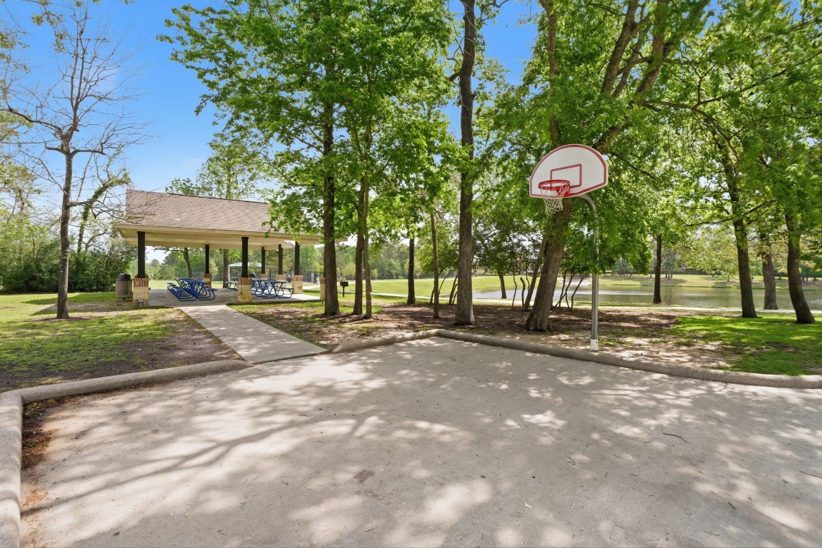 315 Arbor Ridge Lane Conroe, TX 77384 - Photo 42 of 47 Community courts, pond and pavillion