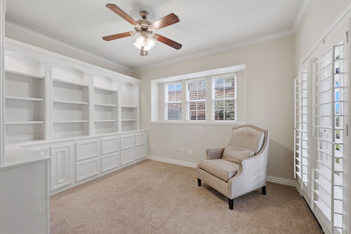 315 Arbor Ridge Lane Conroe, TX 77384 - Photo 9 of 47 The dedicated study, located off the entry, features French doors that lead to the porch and custom built ins.