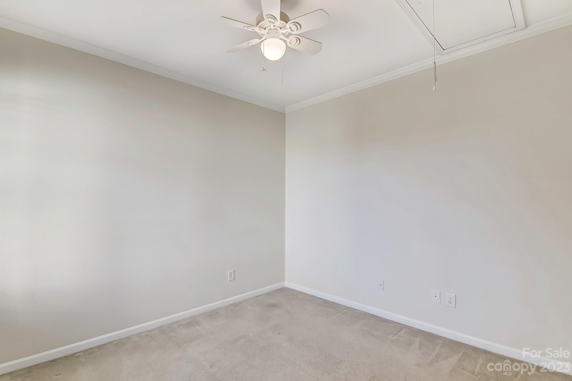 3253 Sapphire Lane Fort Mill, SC 29708 - Photo 17 of 35 an empty room with a ceiling fan and a window