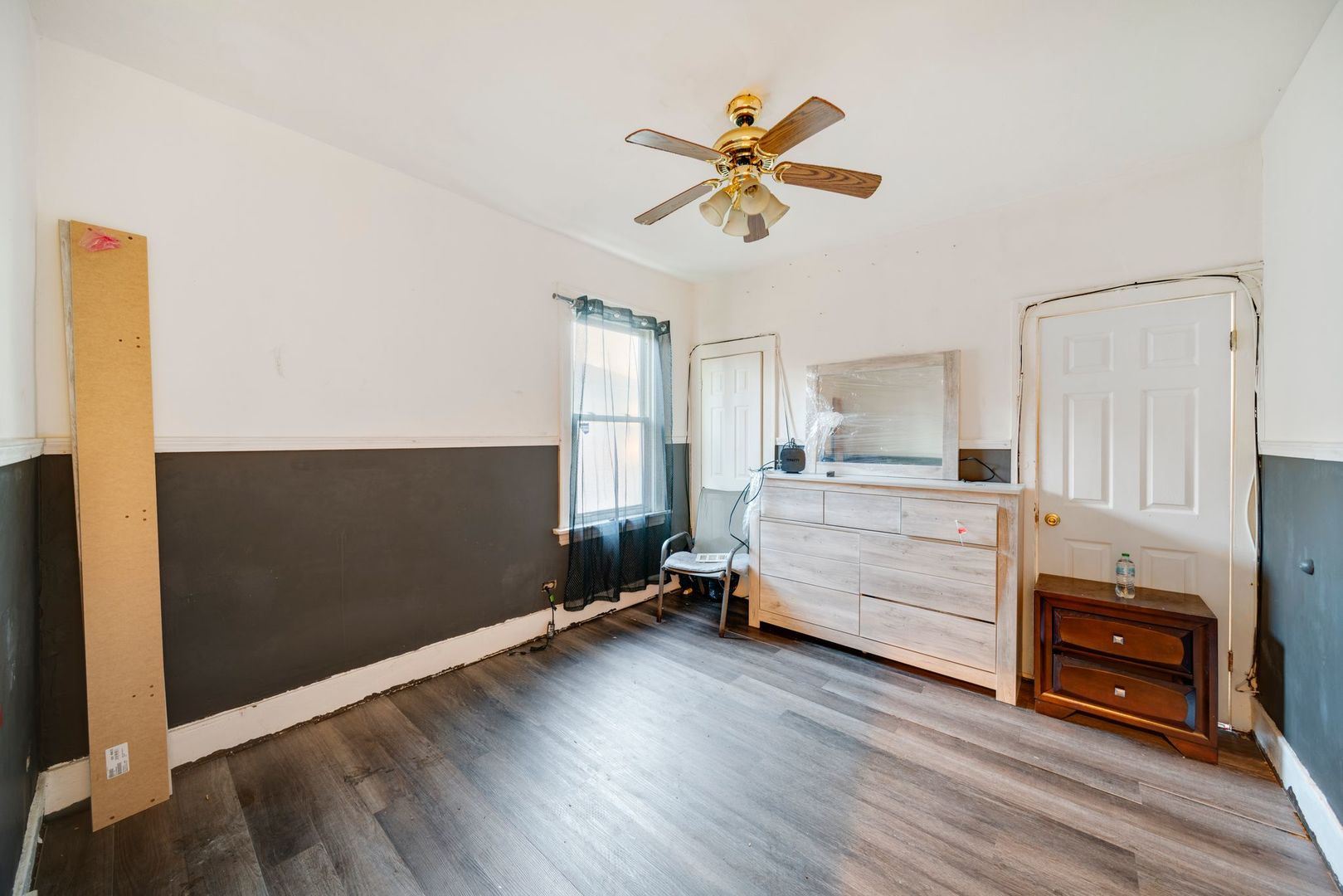 14446 Des Plaines Street Harvey, IL 60426 - Photo 12 of 19 a bedroom with furniture and window