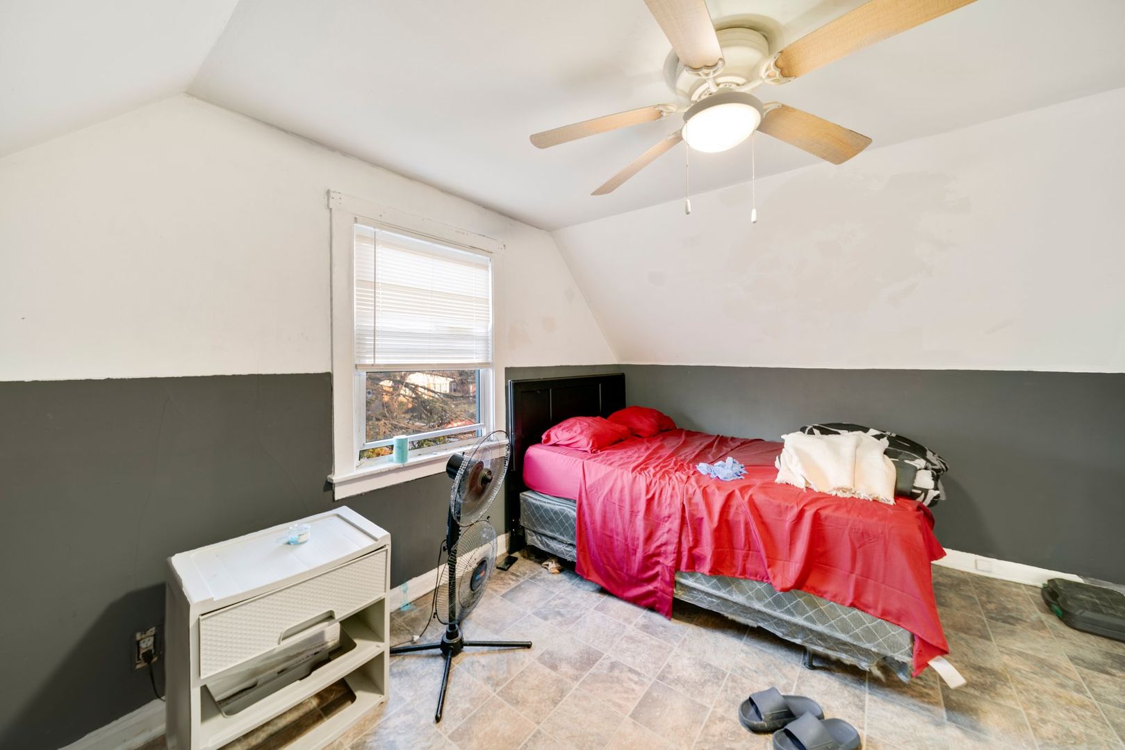 14446 Des Plaines Street Harvey, IL 60426 - Photo 15 of 19 a bedroom with a bed and a window