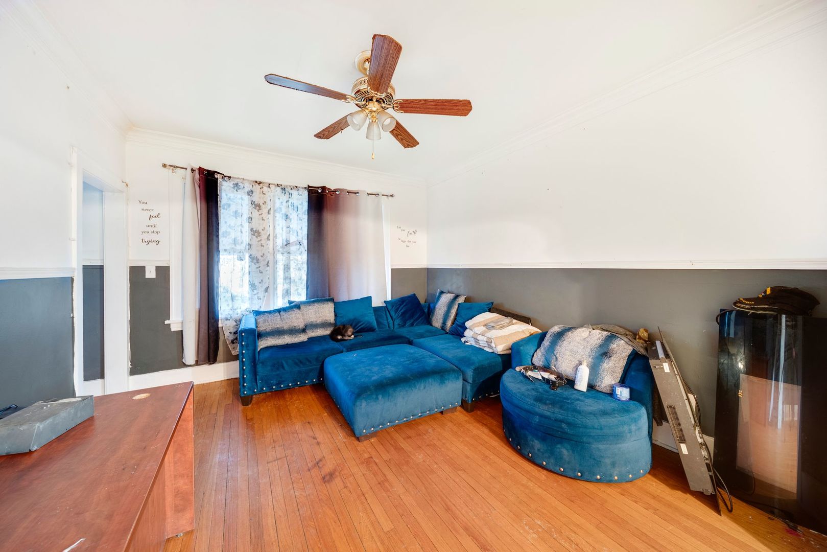 14446 Des Plaines Street Harvey, IL 60426 - Photo 6 of 19 a living room with furniture and a wooden floor