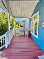 a view of a porch with a glass door