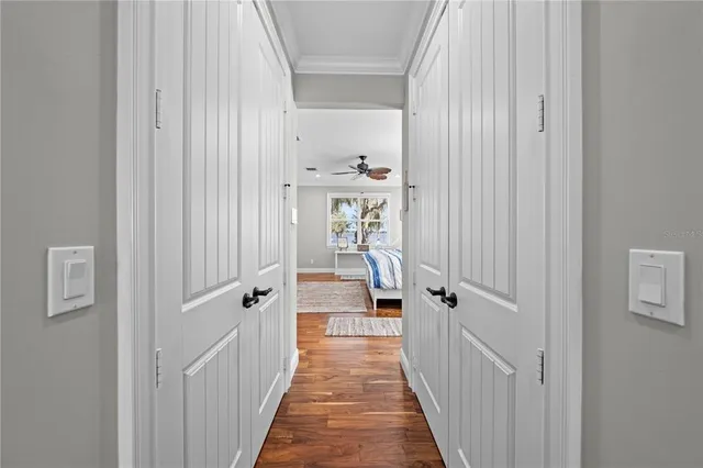 a view of utility room with racks on the wall