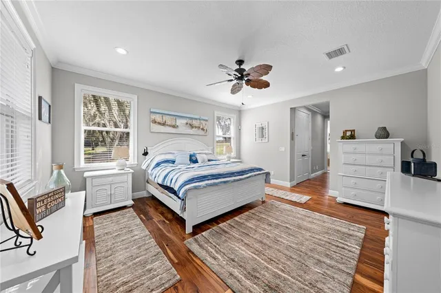 a large bathroom with double vanity and a large mirror
