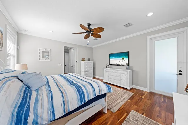 a white toilet sitting next to a window