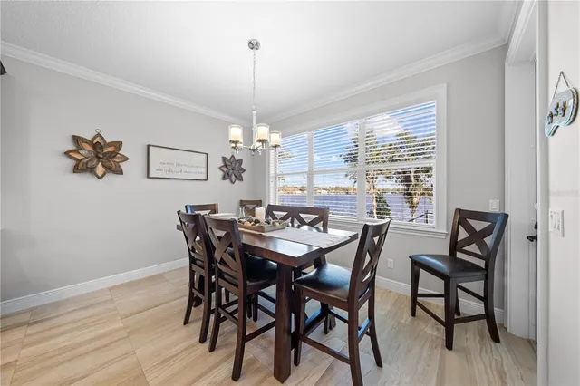 a kitchen with lots of counter top space a stove and wooden floor