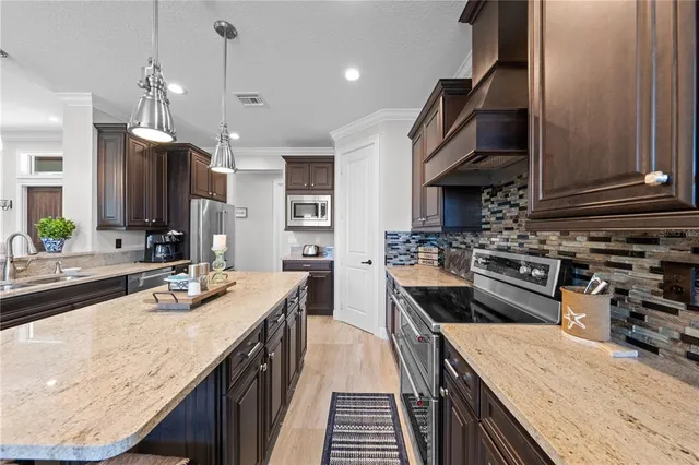 a spacious bathroom with a double vanity sink a mirror and a shower