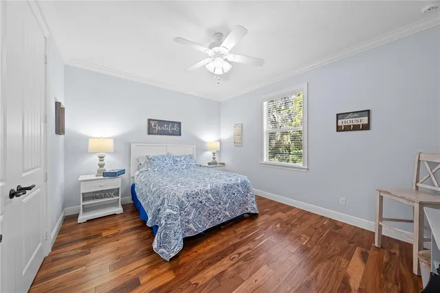 a front view of a house with swimming pool yard and outdoor seating