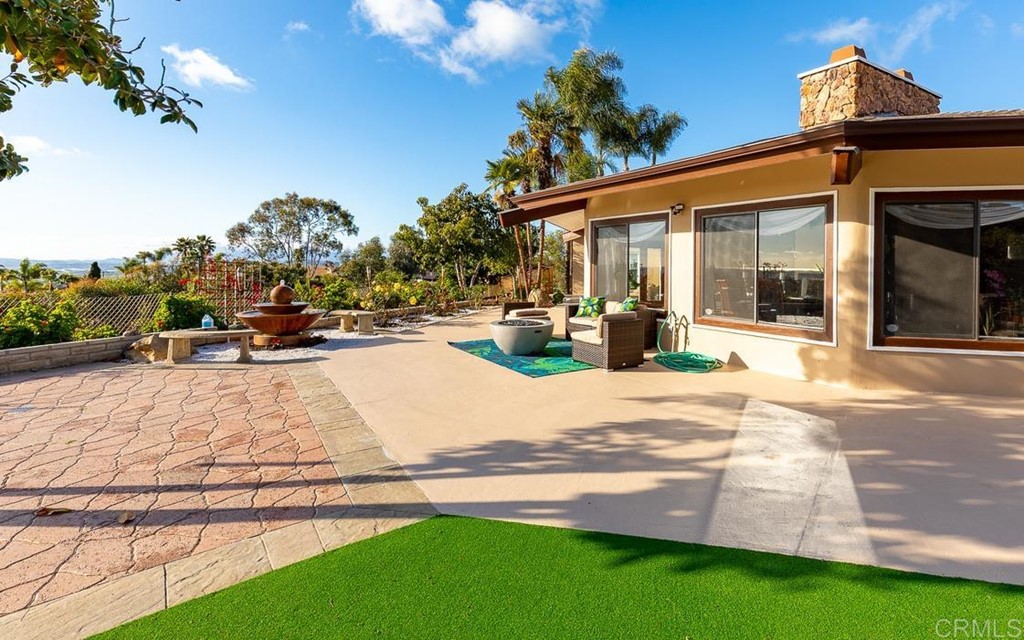 2070 Elevado Hills Drive Vista, CA 92084 - Photo 5 of 27 a view of a house with backyard and sitting area