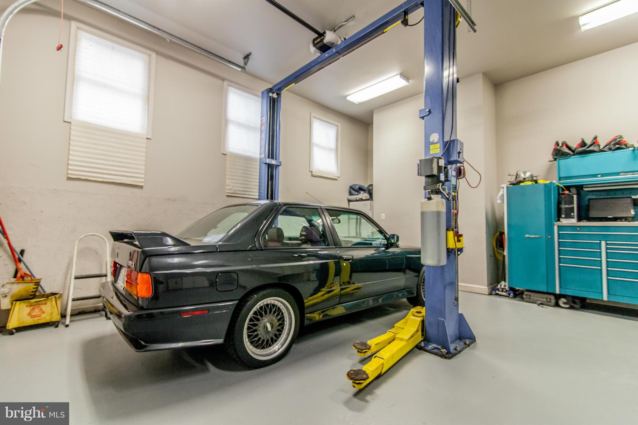 5924 Griffith Road Gaithersburg, MD 20882 - Photo 4 of 30 3 Car Garage w/ Lift