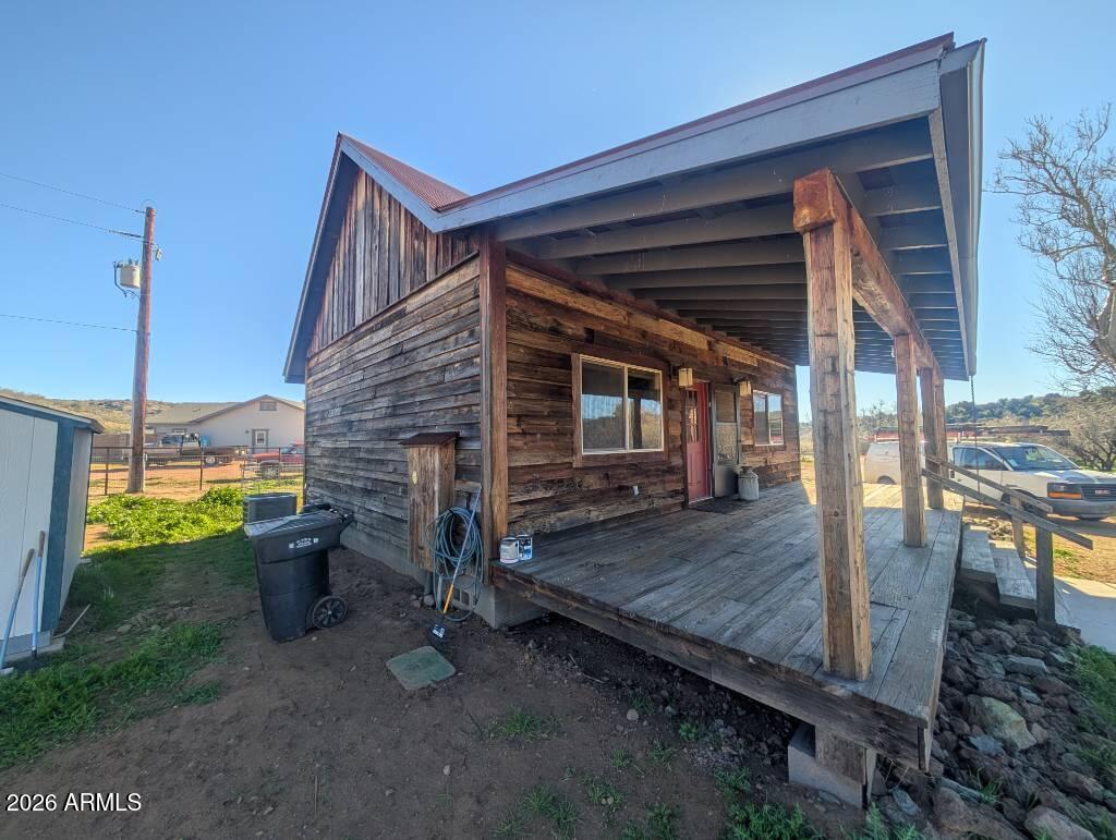 200 West H Bar Ranch Road Payson, AZ 85541 - Photo 17 of 21 a view of a porch with a table and chairs