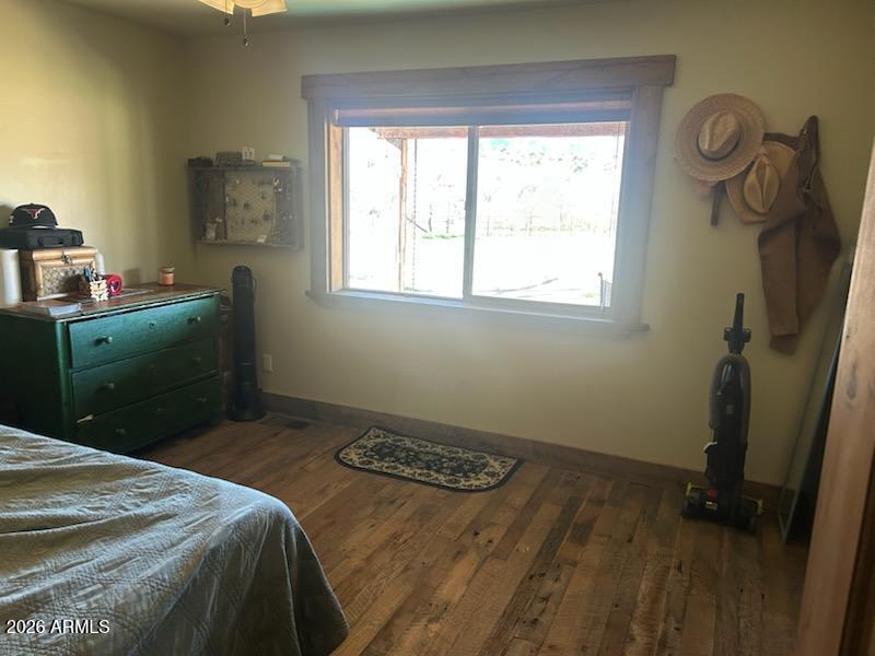 200 West H Bar Ranch Road Payson, AZ 85541 - Photo 10 of 21 a bedroom with a bed and a window