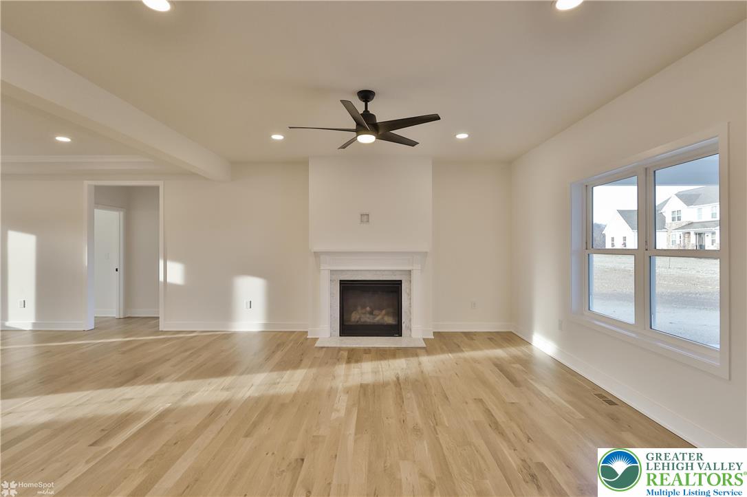 448 Long Lane Road Walnutport, PA 18088 - Photo 19 of 65 a view of a livingroom with a fireplace and window