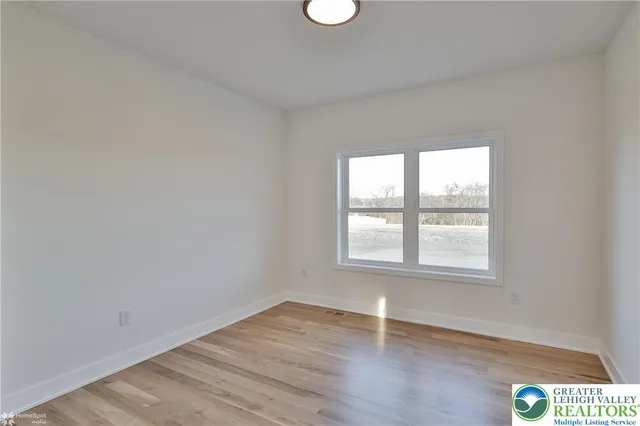 a bathroom with a sink and vanity