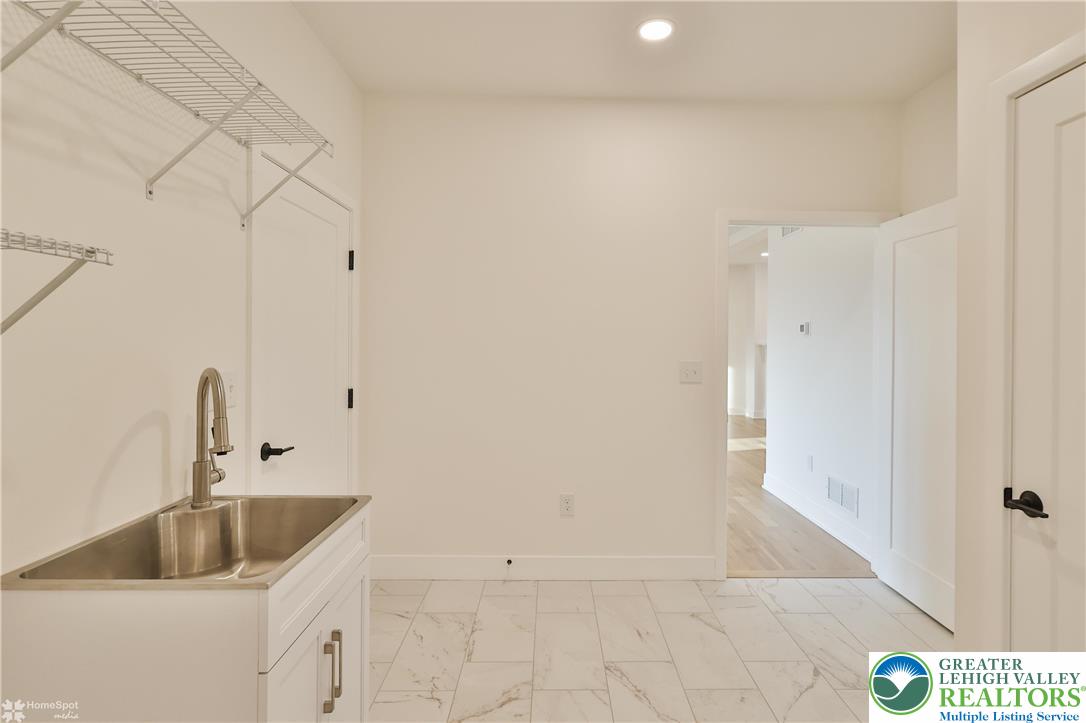 448 Long Lane Road Walnutport, PA 18088 - Photo 57 of 65 a bathroom with a sink and vanity