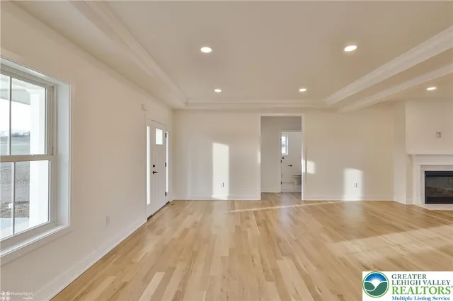 a view of an empty room and window