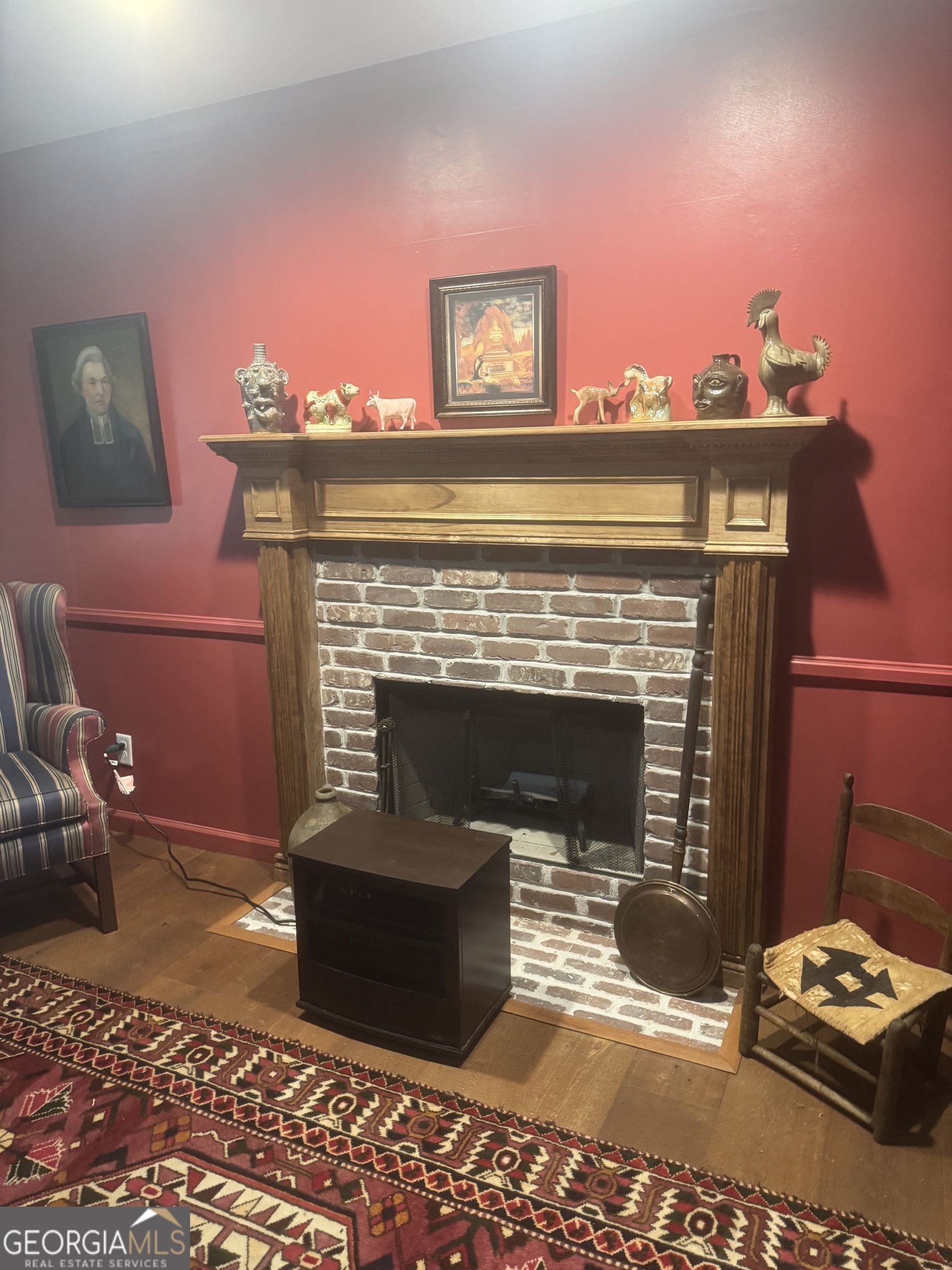 404 Ready Street St. Marys, GA 31558 - Photo 8 of 14 a living room with furniture and a fireplace