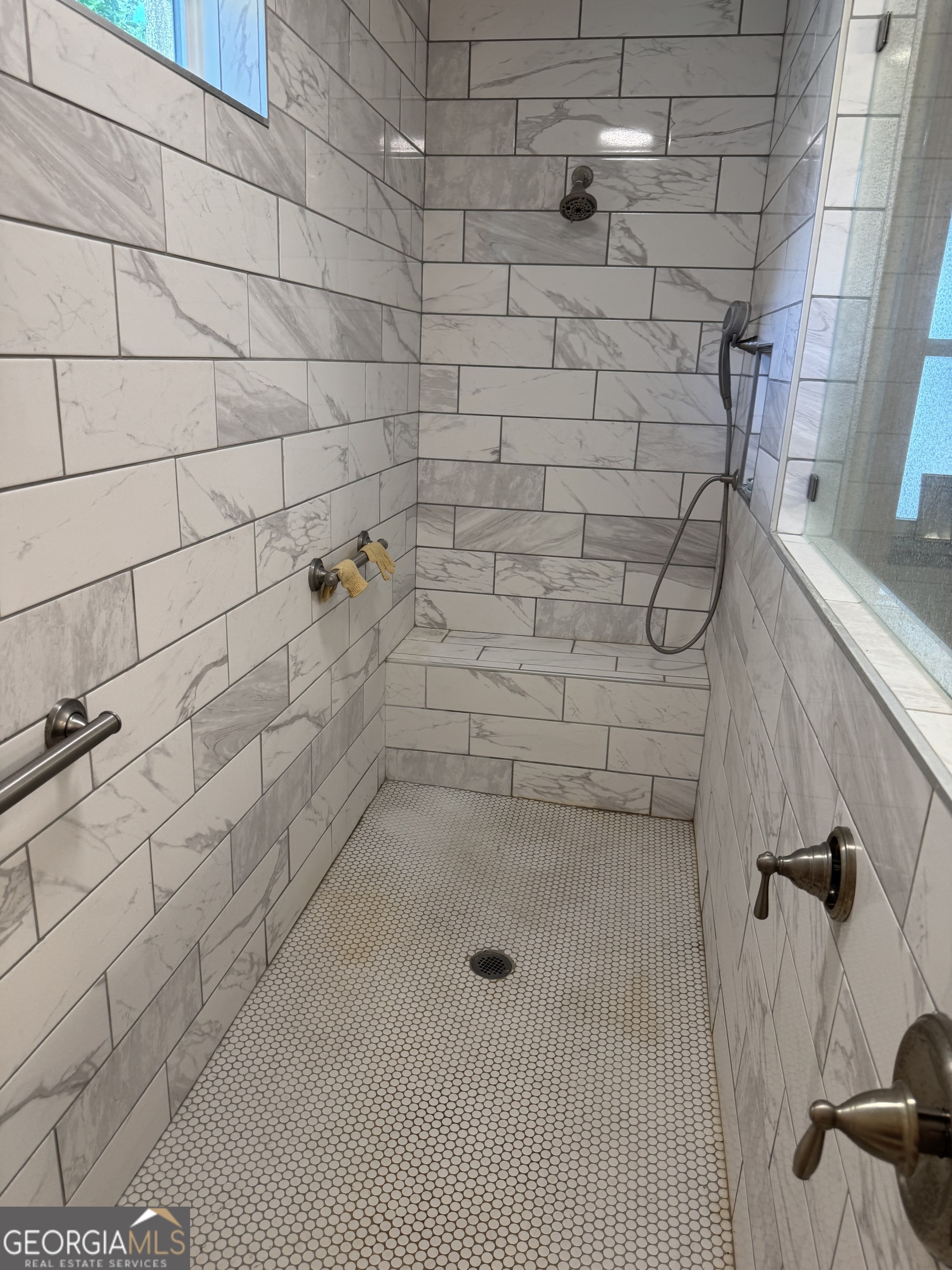 404 Ready Street St. Marys, GA 31558 - Photo 10 of 14 a bathroom with a shower