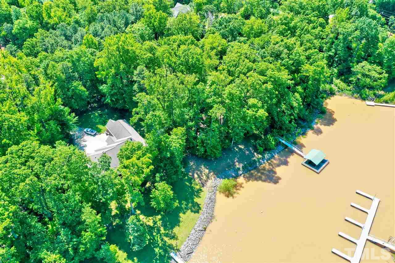 Pointe Place Clarksville, VA 23927 - Photo 1 of 19 a backyard of a house with a yard and outdoor seating