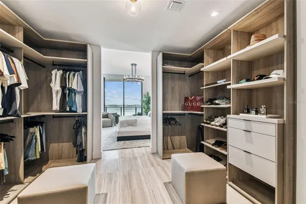 a bathroom with a shower and a mirror