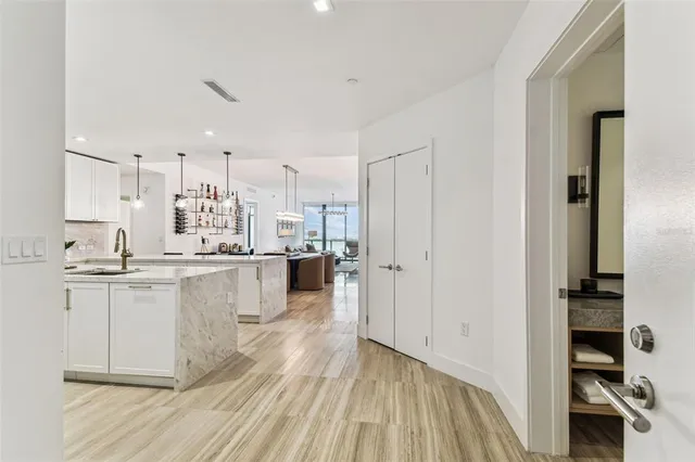 a utility room with sink dryer and washer