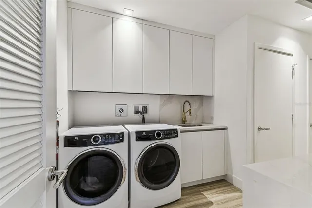 a view of a water heater and a floor