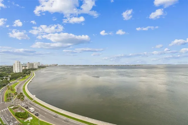 a view of a city with tall buildings