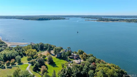 a view of a lake with a mountain in the background