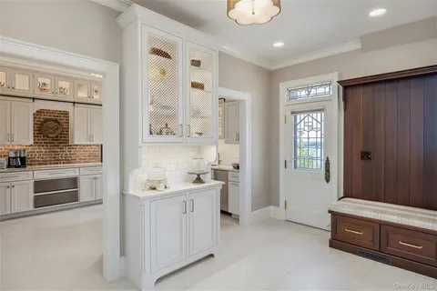 a kitchen with stainless steel appliances granite countertop a sink and a cabinets