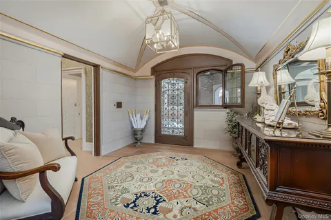 a bedroom with a bed and a fireplace