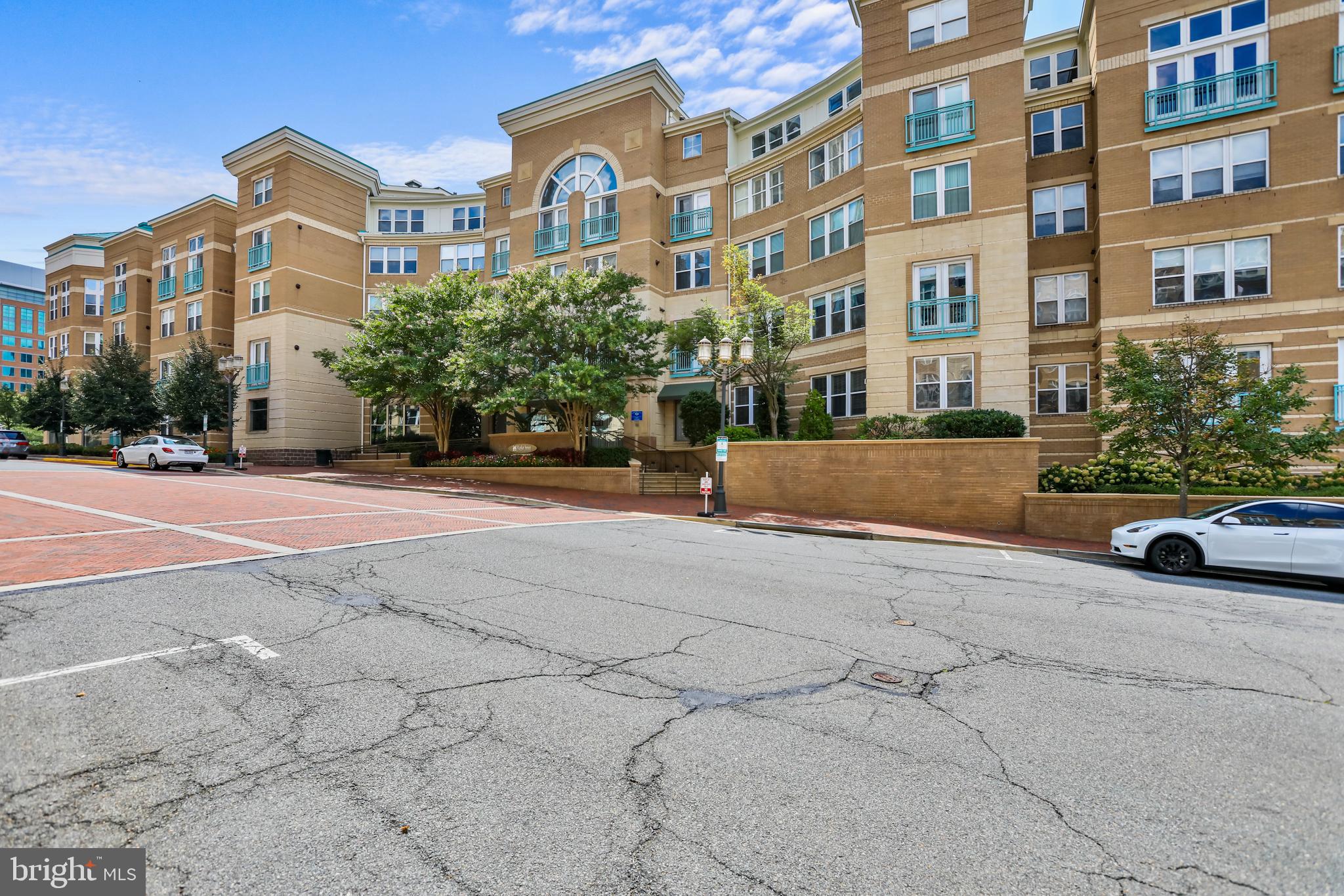 12001 Market Street, Unit T35 Reston, VA 20190 - Photo 1 of 23 a view of building with street view