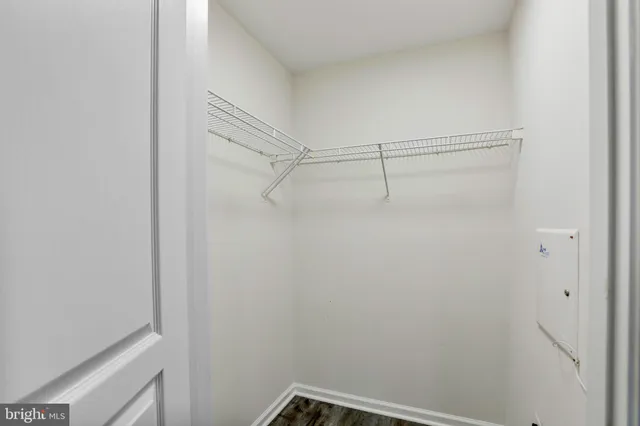 a view of a room with racks on the wall