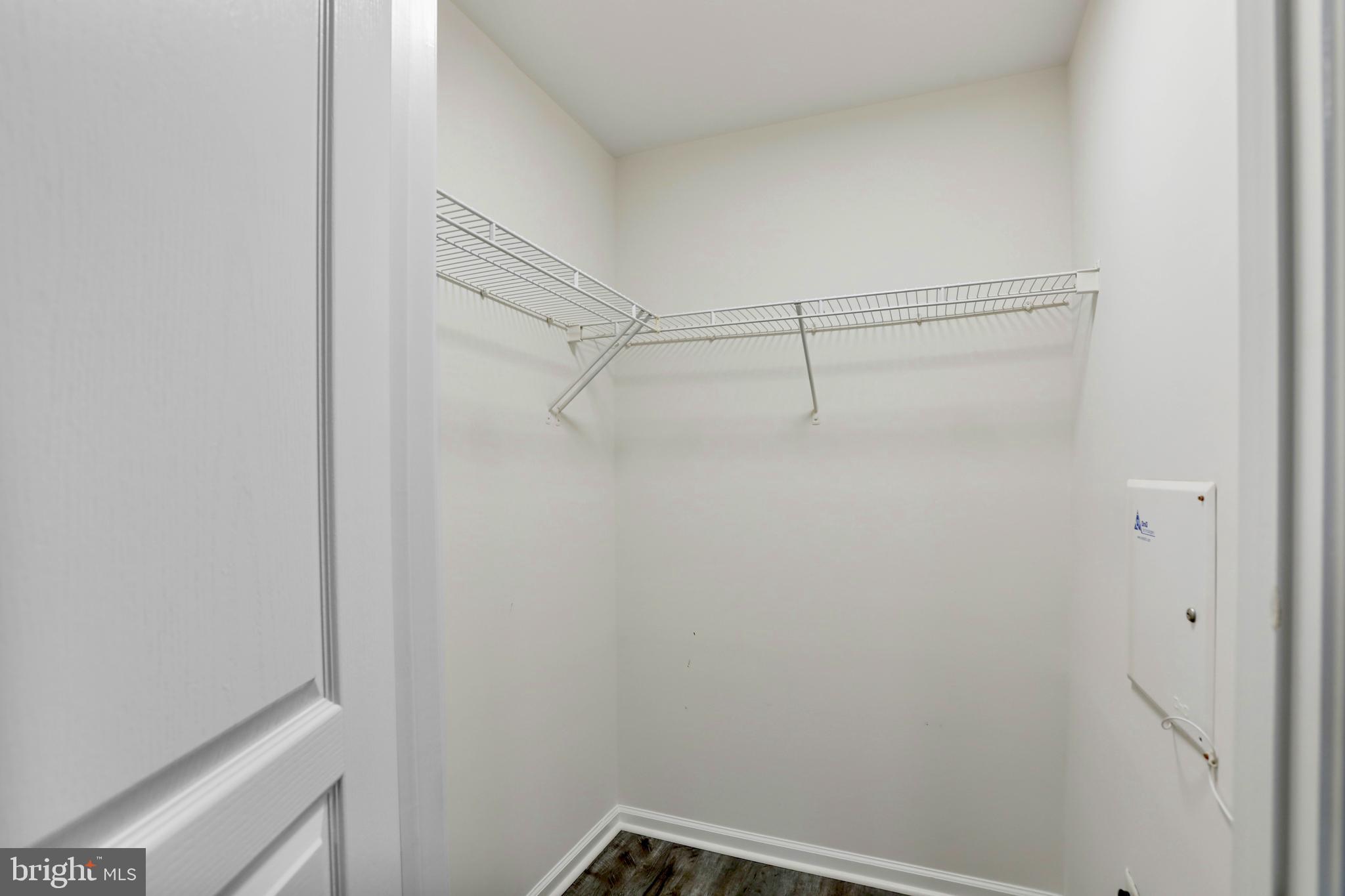 12001 Market Street, Unit T35 Reston, VA 20190 - Photo 12 of 23 a view of a room with racks on the wall