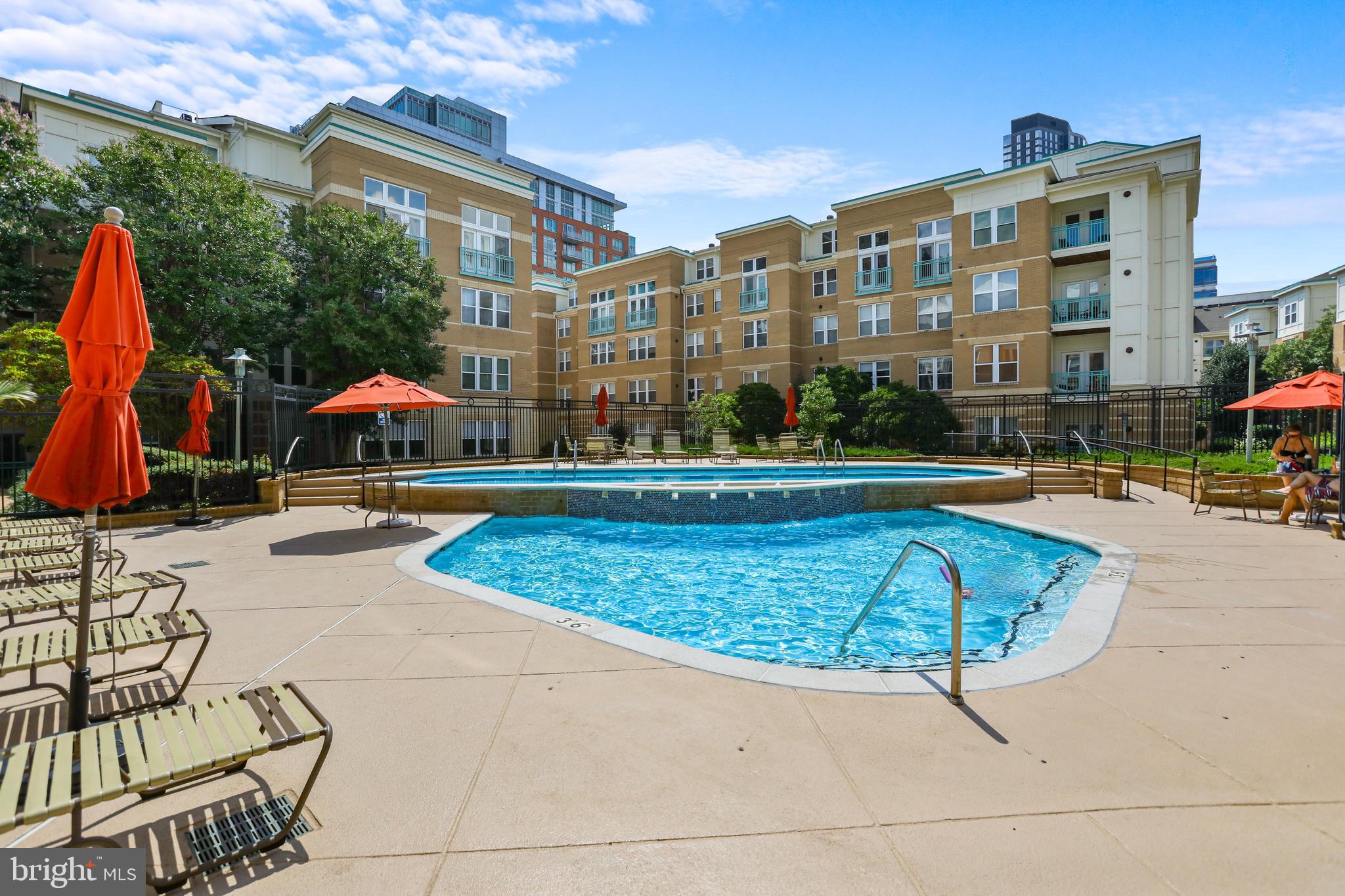 12001 Market Street, Unit T35 Reston, VA 20190 - Photo 20 of 23 a view of building with swimming pool and porch