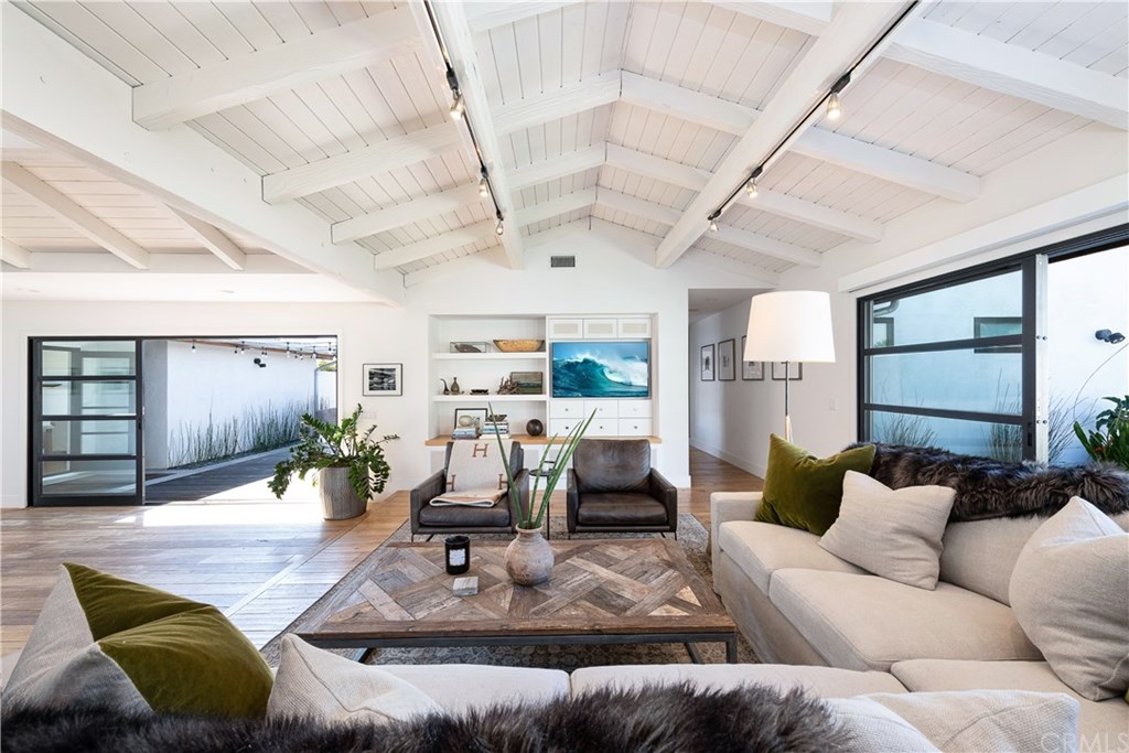 32561 Balearic Dana Point, CA 92629 - Photo 19 of 41 Open and airy Living Room w/ sliding doors to courtyard and backyard.