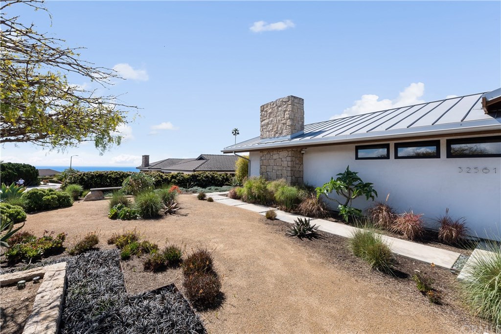 32561 Balearic Dana Point, CA 92629 - Photo 37 of 41 Ocean peek from front yard. Drought tolerant landscaping is beautiful and effortless to maintain.