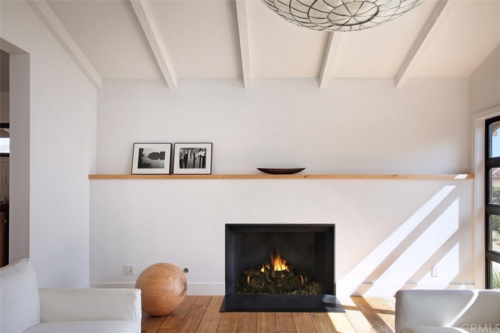 32561 Balearic Dana Point, CA 92629 - Photo 10 of 41 Fireplace with custom mantel in Formal Living Room.