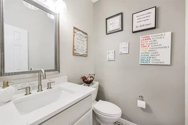 a dining room with furniture window and wooden floor