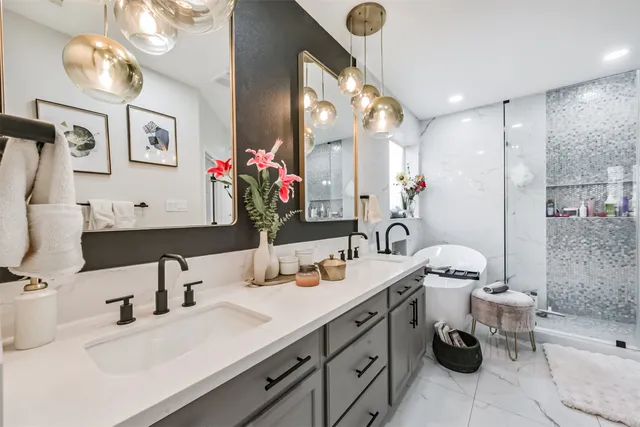 a view of living room with furniture and a fireplace