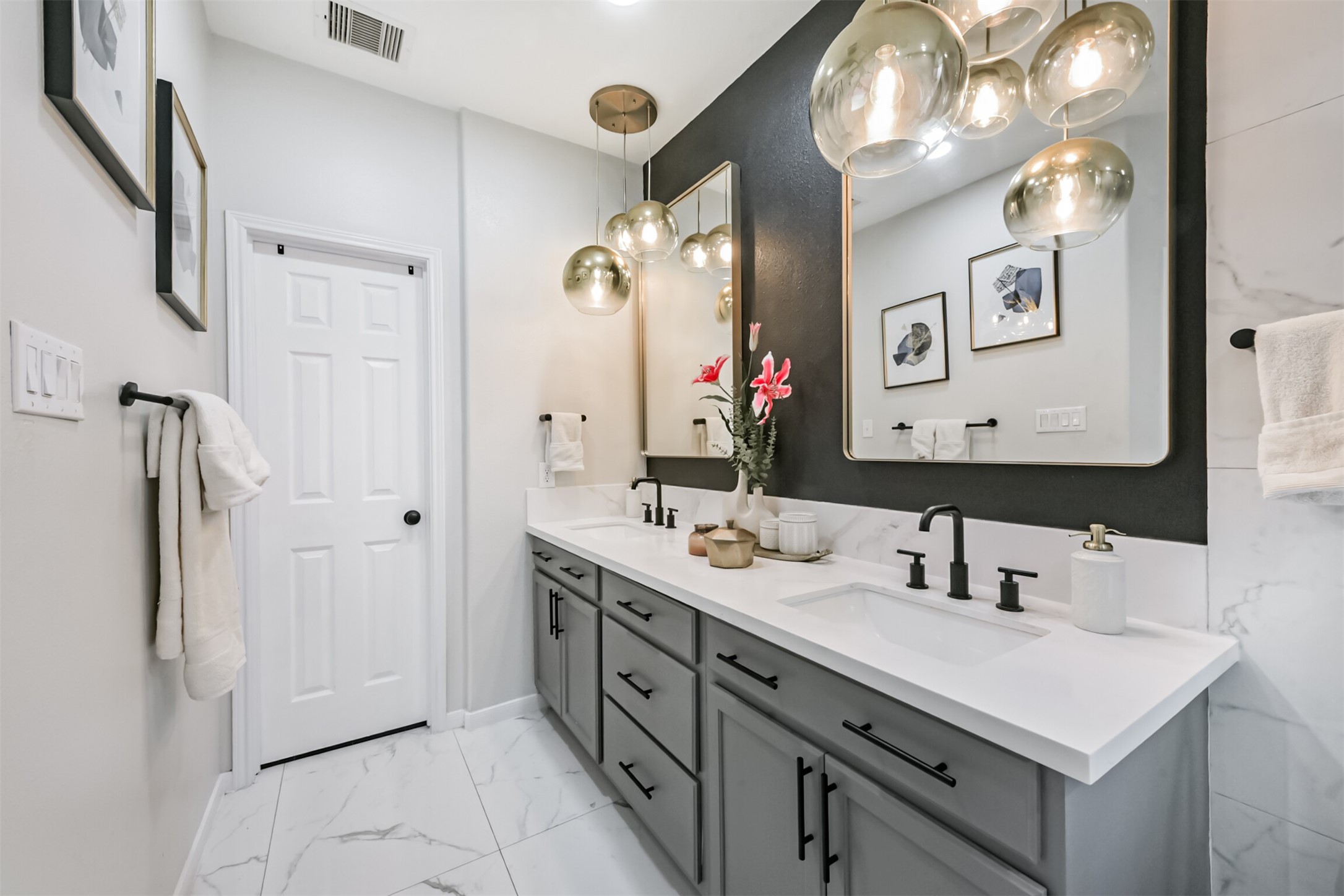 6806 Russelfield Lane Houston, TX 77049 - Photo 17 of 46 Upgraded Marble Tiles, New mirrors, Lighting, Hardware and even the walls!