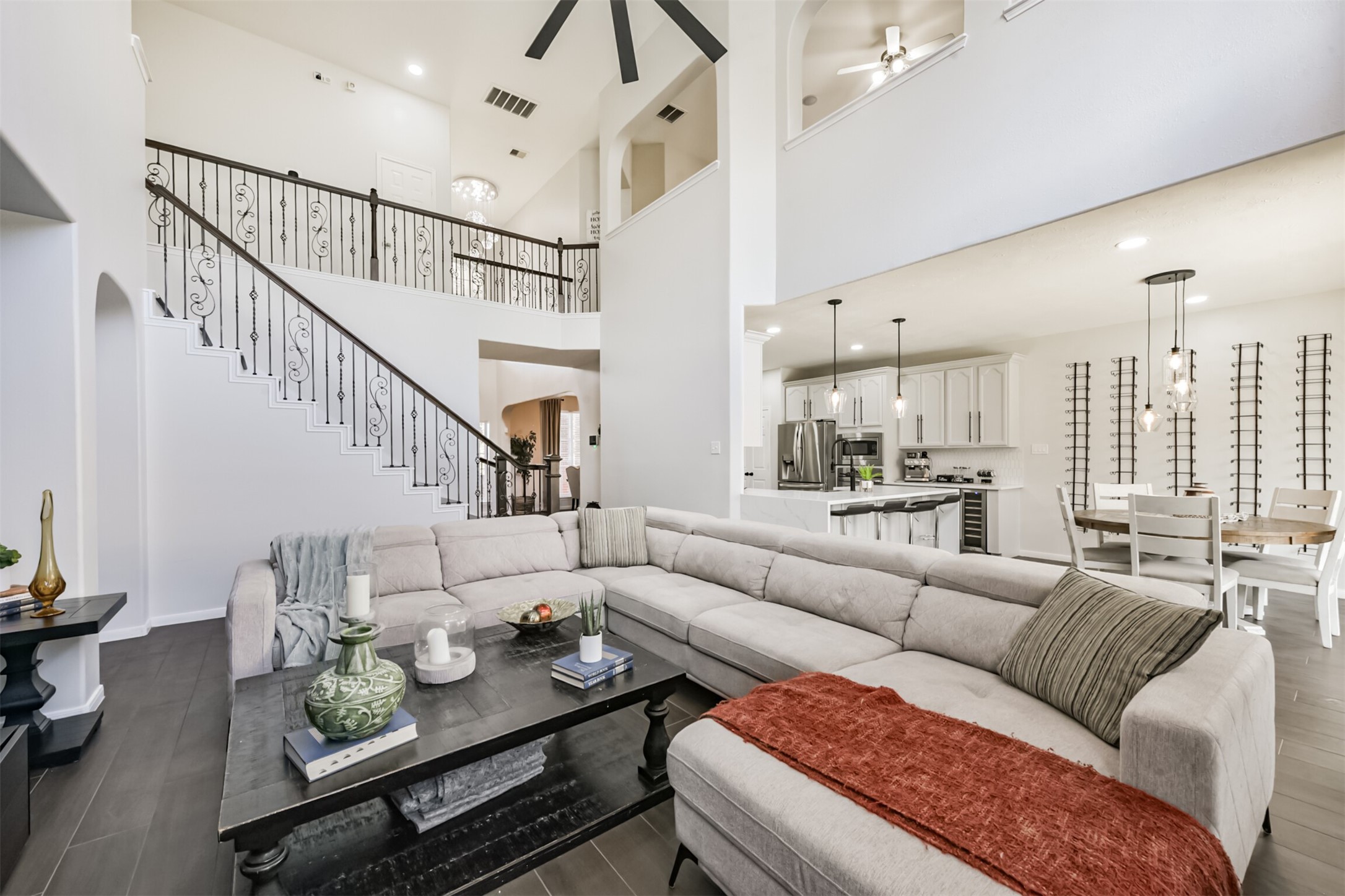 6806 Russelfield Lane Houston, TX 77049 - Photo 18 of 46 a living room with furniture and a dining table