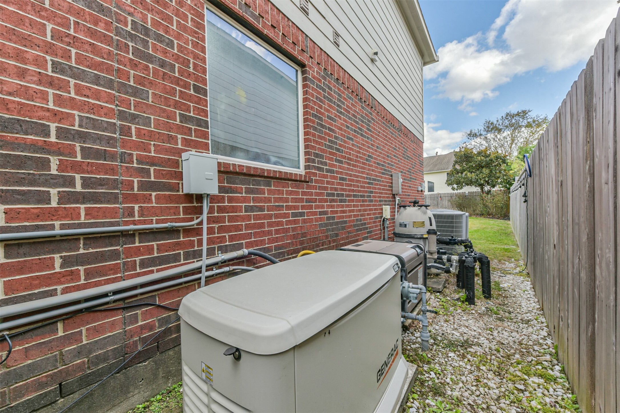 6806 Russelfield Lane Houston, TX 77049 - Photo 41 of 46 a backyard of a house with table and chairs